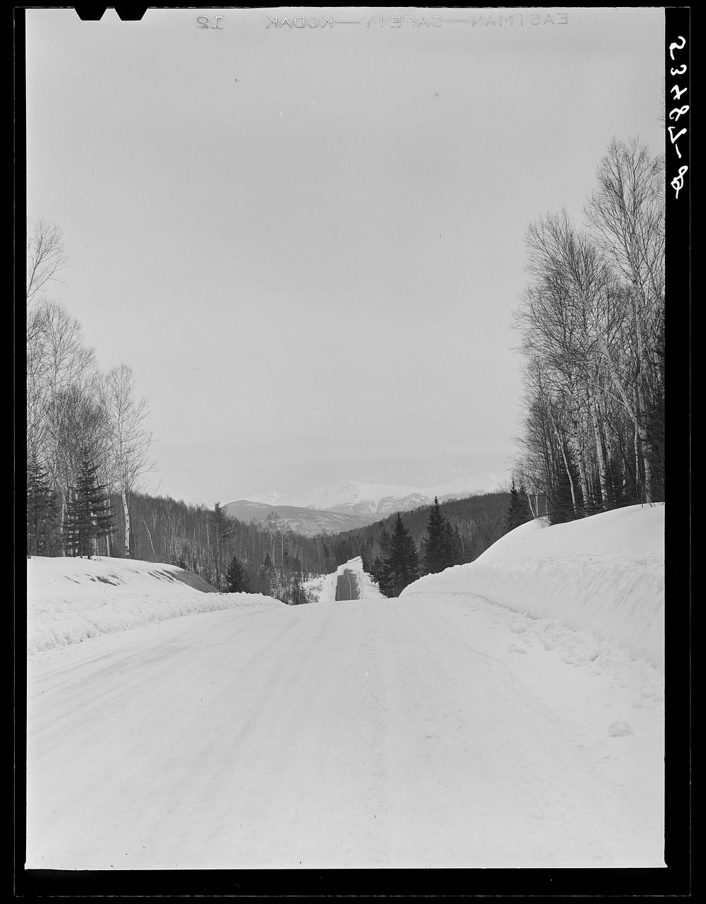 [Untitled photo, possibly related to: Country road and farms near Stowe, Vermont. Snowscene]. Sourced from the Library of…