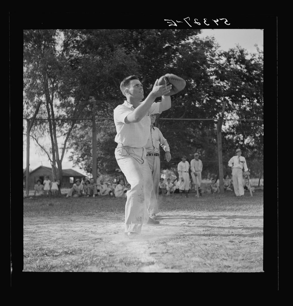 Baseball game on Saturday afternoon. Terrebonne Project, Schriever, Louisiana. Sourced from the Library of Congress.