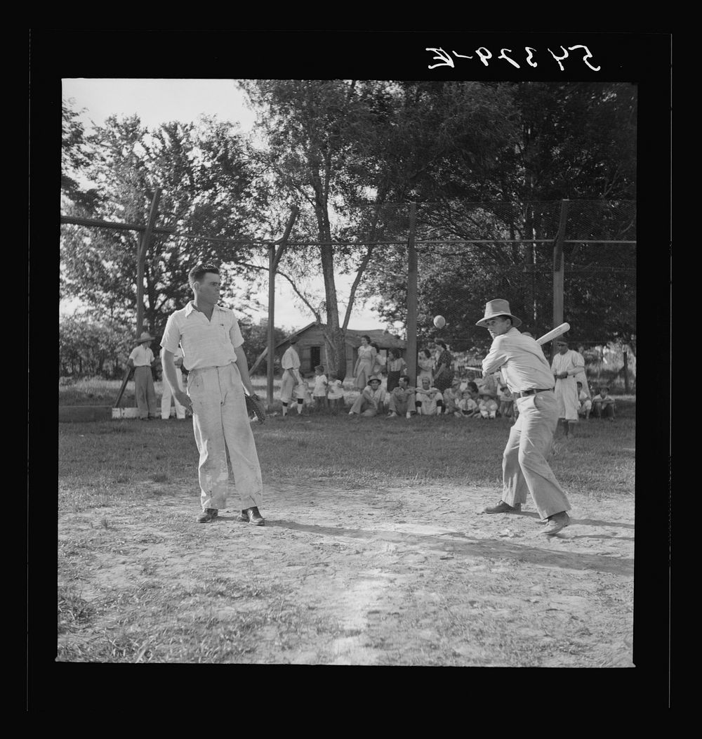 Baseball game on Saturday afternoon. Terrebonne Project, Schriever, Louisiana. Sourced from the Library of Congress.