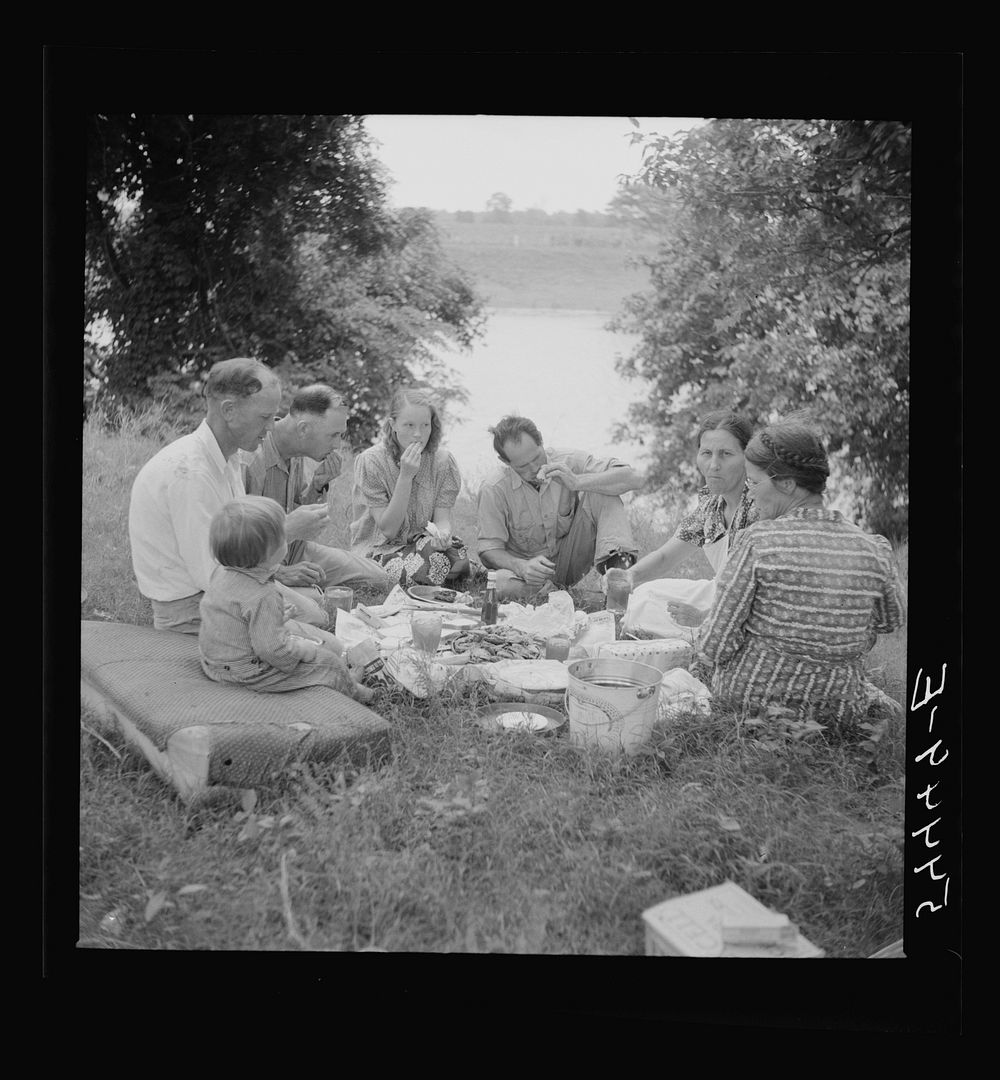 [Untitled photo, possibly related to: Farm family having fish fry along Cane River on Fourth of July near Natchitoches…