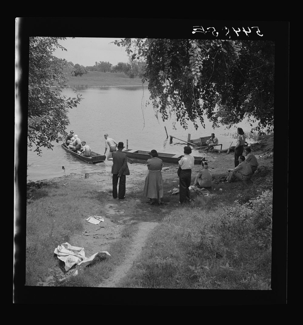 Boating and fishing along Cane River on Fourth of July near Natchitoches, Louisiana. Sourced from the Library of Congress.