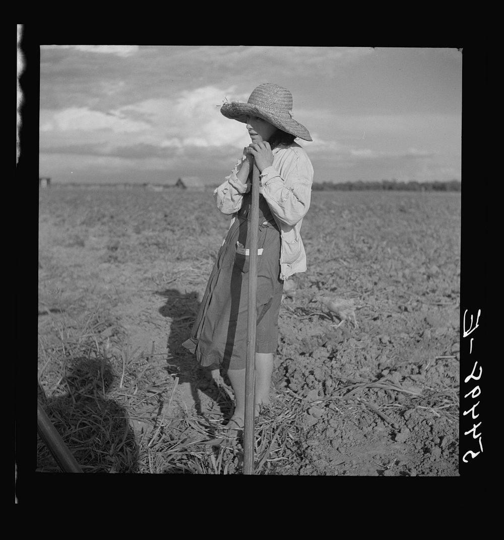 Member of Allen Plantation cooperative association resting from hoeing cotton. Near Natchitoches. Sourced from the Library…