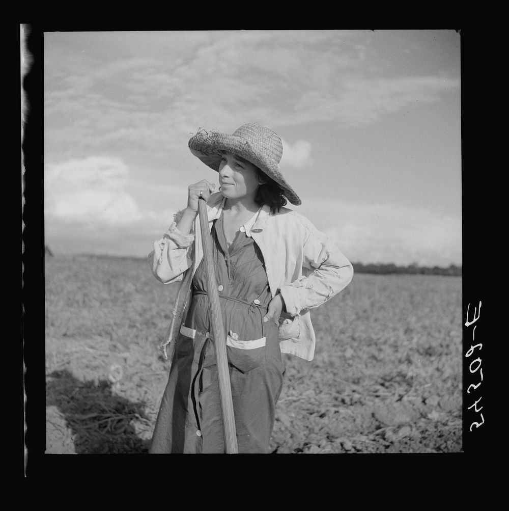Member of Allen Plantation cooperative association resting from hoeing cotton. Near Natchitoches, Louisiana. Sourced from…