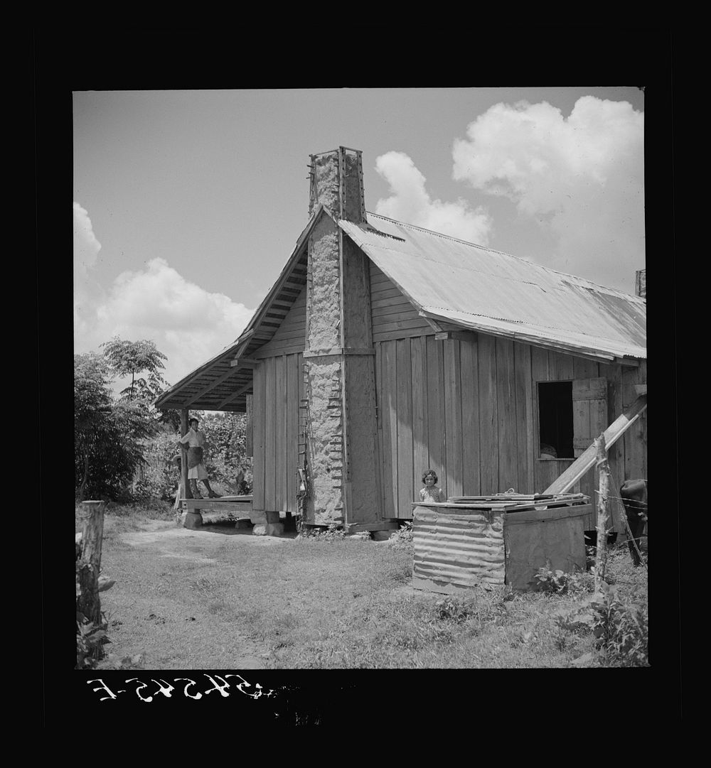 Melrose, Natchitoches Parish, Louisiana. Chimney built of mud and sticks on home of mulatto family, a tenant on Balthazar…