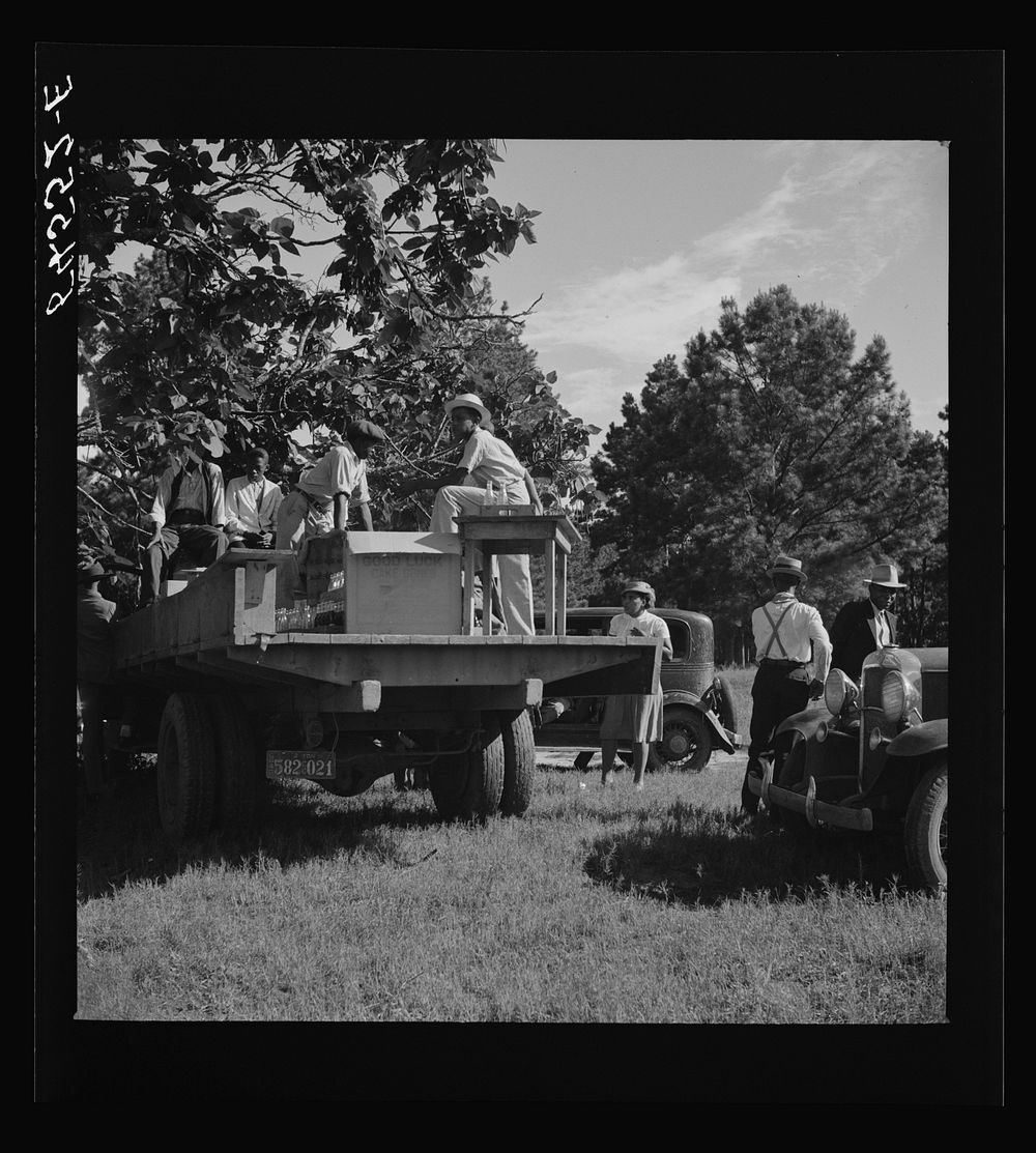 [Untitled photo, possibly related to: Melrose, Natchitoches Parish, Louisiana. Selling ice cream cones and cold drinks…