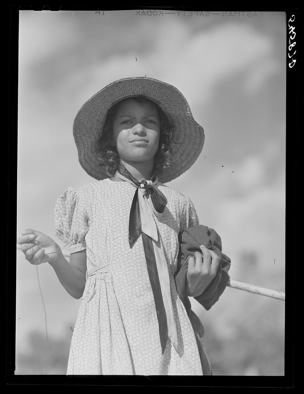 [Untitled photo, possibly related to: Melrose, Natchitoches Parish, Louisiana. Daughter of mulatto family returning home…