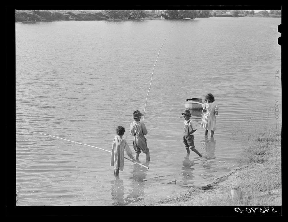 [Untitled photo, possibly related to: Melrose, Natchitoches Parish, Louisiana. Mulatto children fishing the Cane River].…