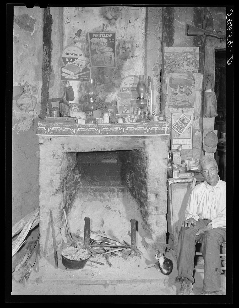 Melrose, Natchitoches Parish, Louisiana. Fireplace in old mud hut built and still lived in by French mulattoes near John…