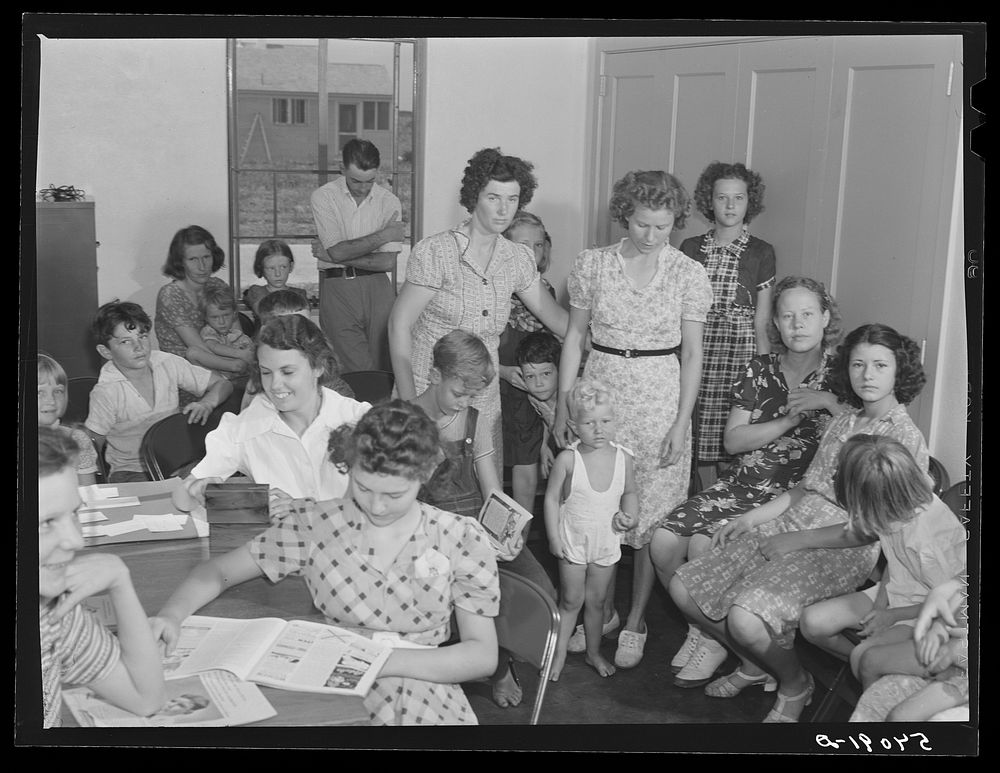 Waiting room in clinic on typhoid antitoxin day at Osceola migratory labor camp. Belle Glade, Florida. Sourced from the…