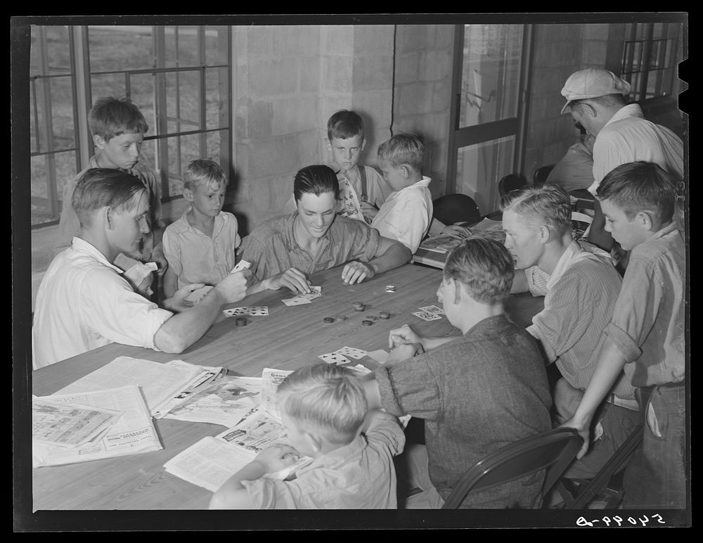 The assembly building is always open for games, reading, recreation and meetings at Osceola migratory labor camp. Belle…