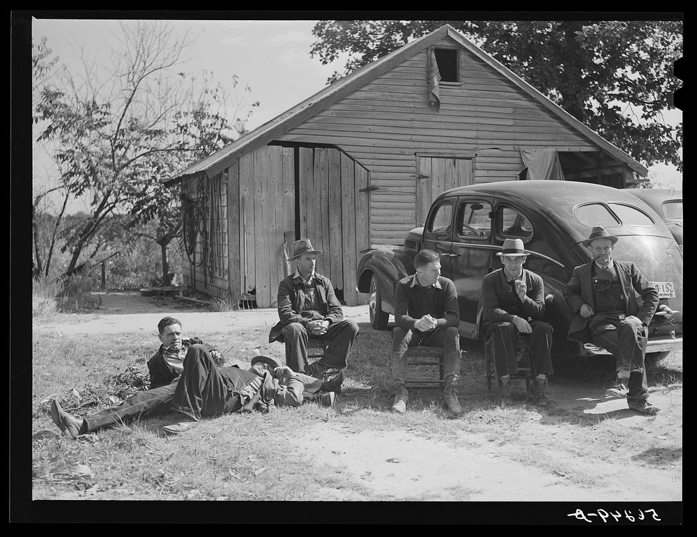 [Untitled photo, possibly related to: Resting after dinner following a corn shucking on Hooper Farm in Corbett Ridge…