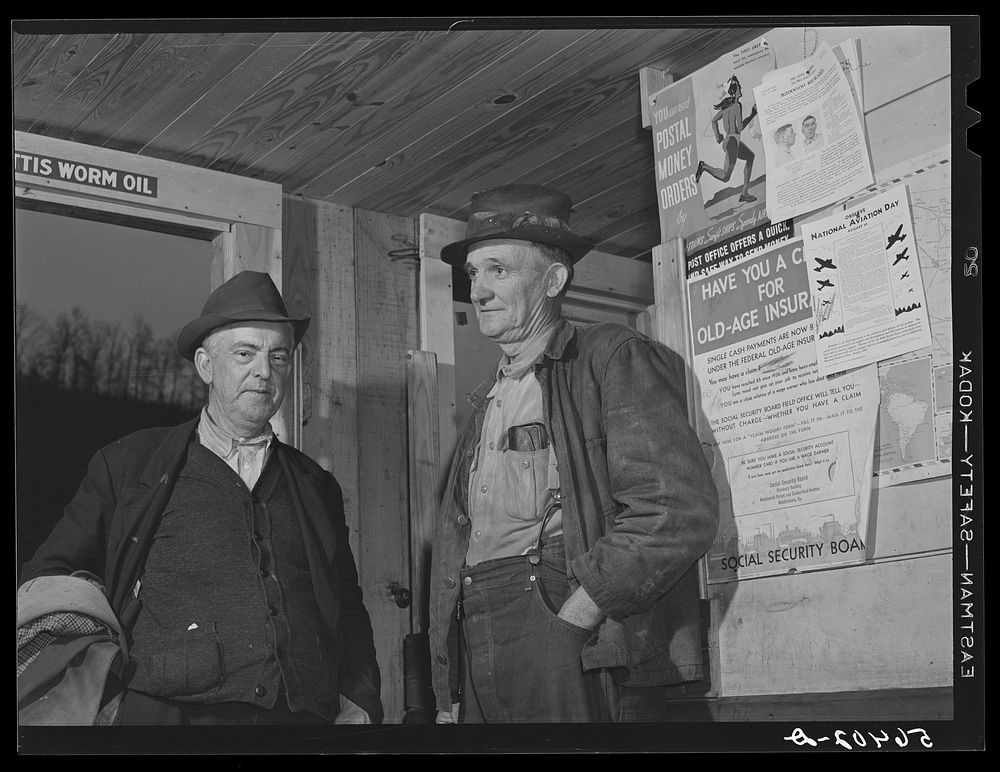 John Patterson and S.H. Castle inside Mr. Castle's store and post office. Southern Appalachian Project, Knox County, near…