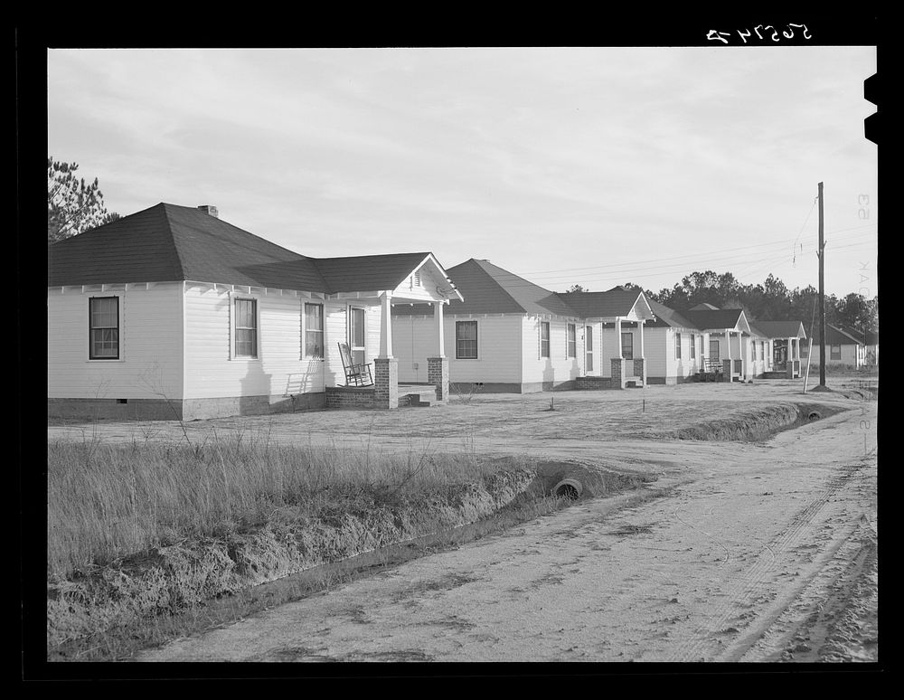 New homes of Army men's families on Milstead Avenue, about five miles outside of Columbus, Georgia. They were built this…