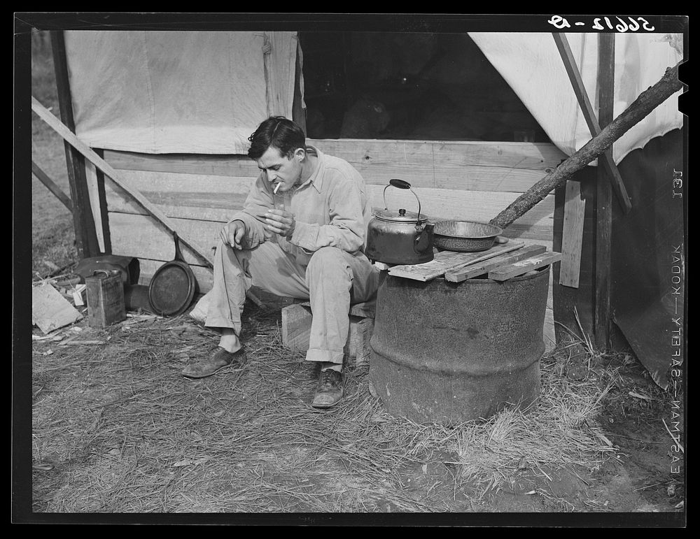 D.C. Lovelady in front of tent. He drives a truck at Camp Livingston construction job and is from Monroe, Louisiana. Sourced…