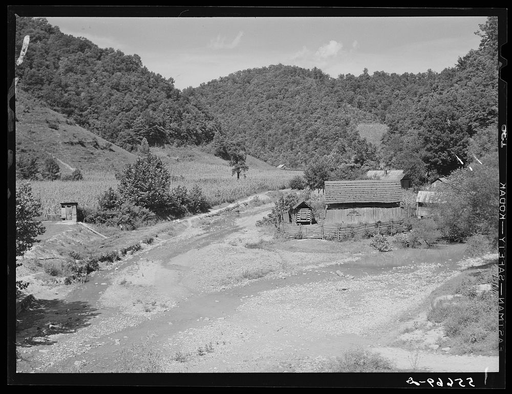 General landscape near Hyden, Kentucky showing mountain cabins, sheds and cornfields. Sourced from the Library of Congress.