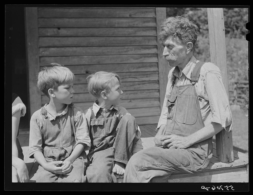 Mountaineer with his two grandsons whom he raised in his home with the help of the neighbors. He had been crippled with…
