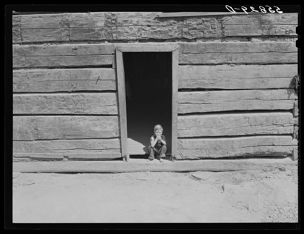 Old mountain cabin made of hand hewn logs near Jackson, Breathitt County, Kentucky. Sourced from the Library of Congress.