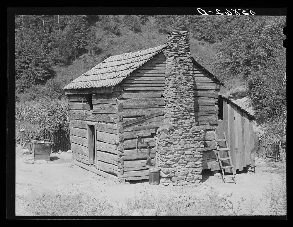 Old mountain cabin made of handhewn logs near Jackson, Breathitt County, Kentucky. Sourced from the Library of Congress.