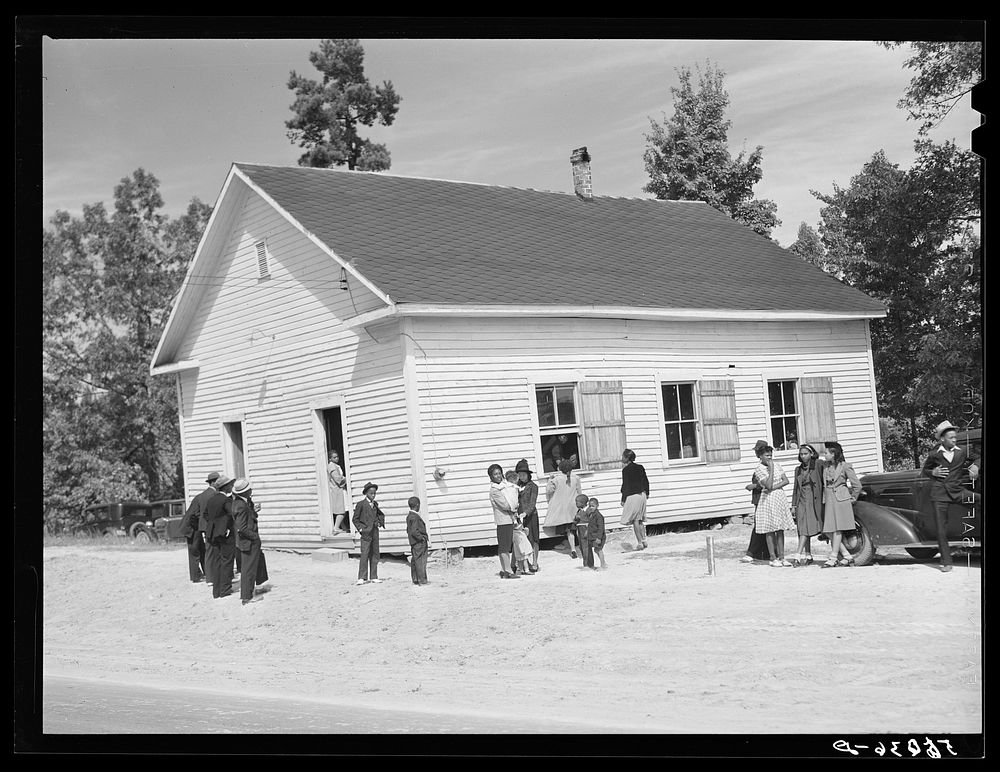 [Untitled photo, possibly related to: A minister and deacons meeting in  church. Caswell County, North Carolina]. Sourced…