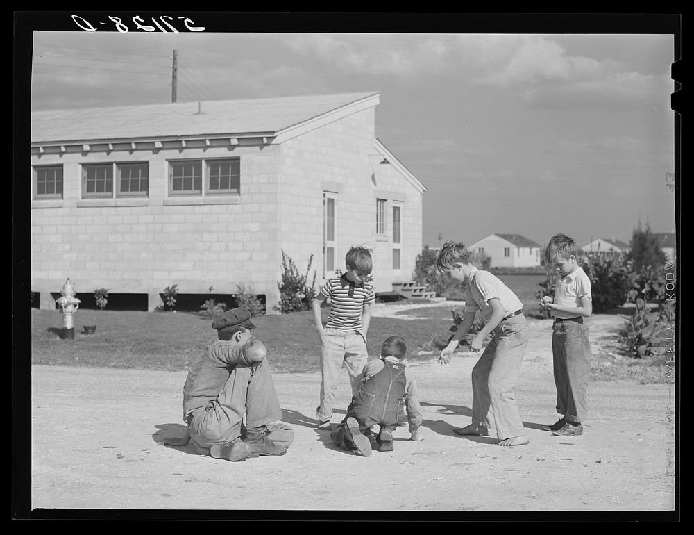Children agricultural workers playing. Osceola migratory labor camp, Belle Glade, Florida. Sourced from the Library of…