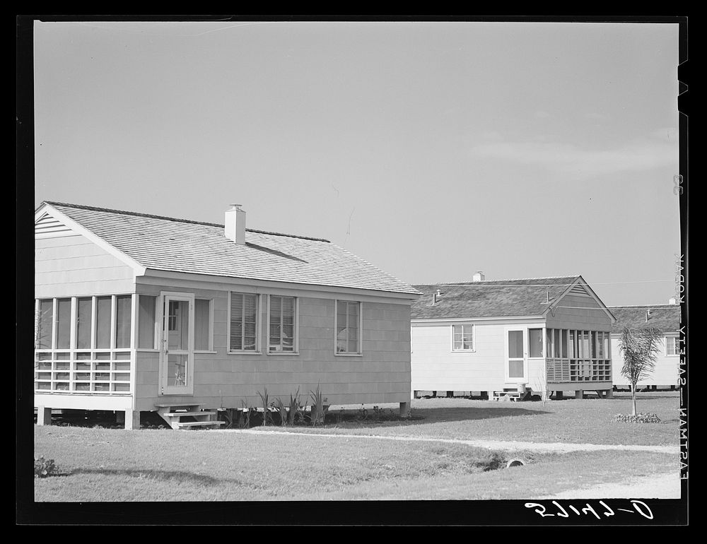 Labor homes for agricultural workers in Osceola migratory labor camp. Belle Glade, Florida. Sourced from the Library of…