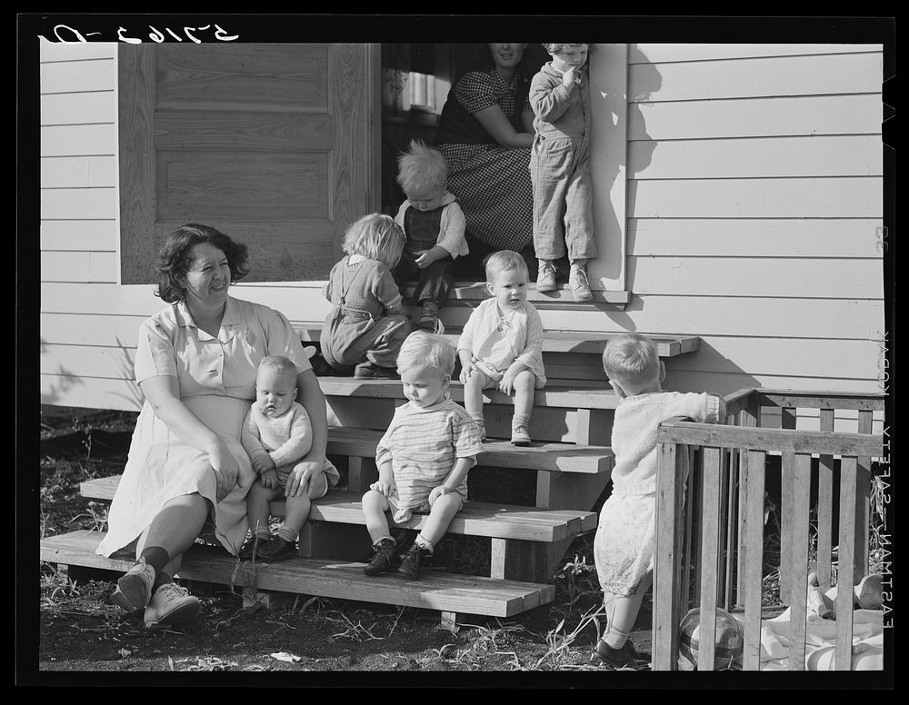 Agricultural workers' children outside the twenty-four hour a day nursery at Osceola migratory labor camp. Belle Glade…