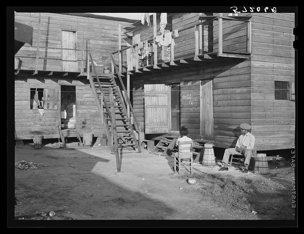 "Hotel" in Pahokee, Lake Okeechobee, Florida, living quarters for migratory agricultural workers. Sourced from the Library…
