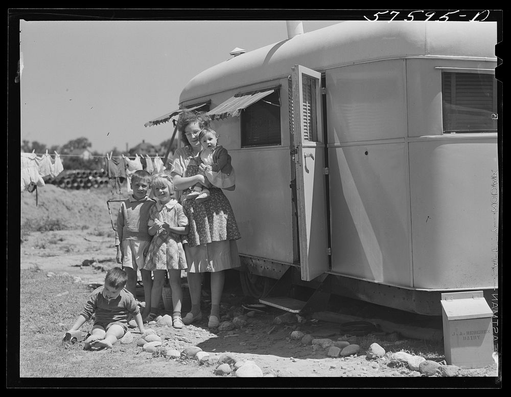 Mrs. Frank Robbins and her children, who live in trailer near United Aircraft where her husband works nights. East Hartford…