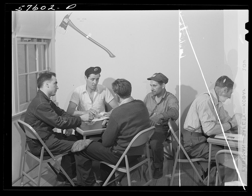 Workers from electric boat company in recreation room of new dormitory for workers in defense industries. Groton…