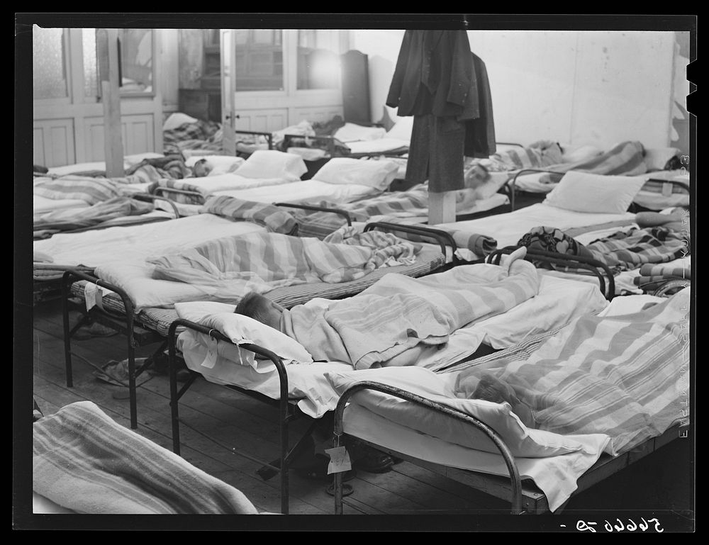[Untitled photo, possibly related to: Flophouse of about thirty-seven beds at fifty cents each, constantly crowded with…