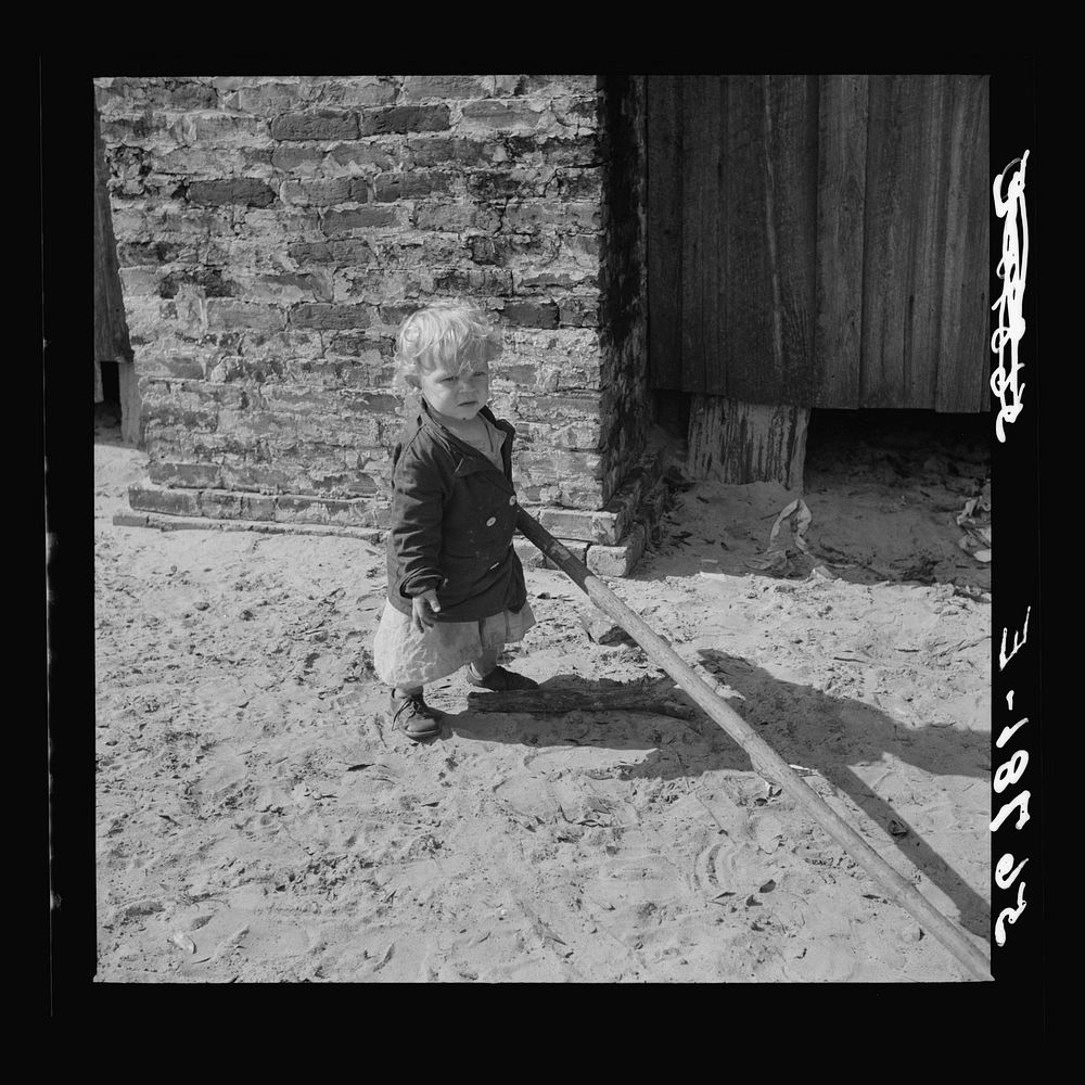 [Untitled photo, possibly related to: Child of construction worker who had been employed on Camp Blanding job. Starke…