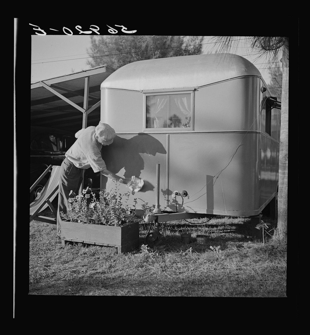 Guests at Sarasota trailer park, Sarasota, Florida, washing his trailer. Sourced from the Library of Congress.