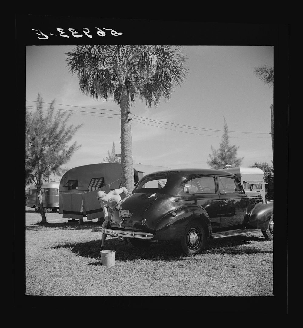 [Untitled photo, possibly related to: Guest at Sarasota trailer park, Sarasota, Florida, washing his car]. Sourced from the…