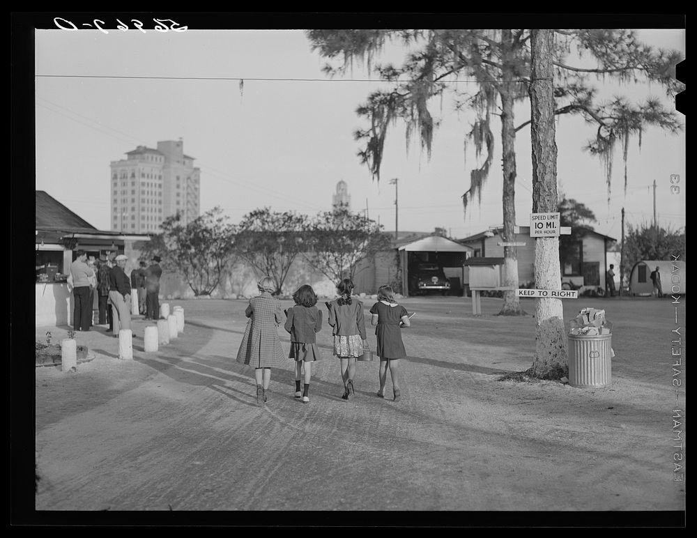 Children going to school in the morning. Sarasota trailer park, Sarasota, Florida. Sourced from the Library of Congress.