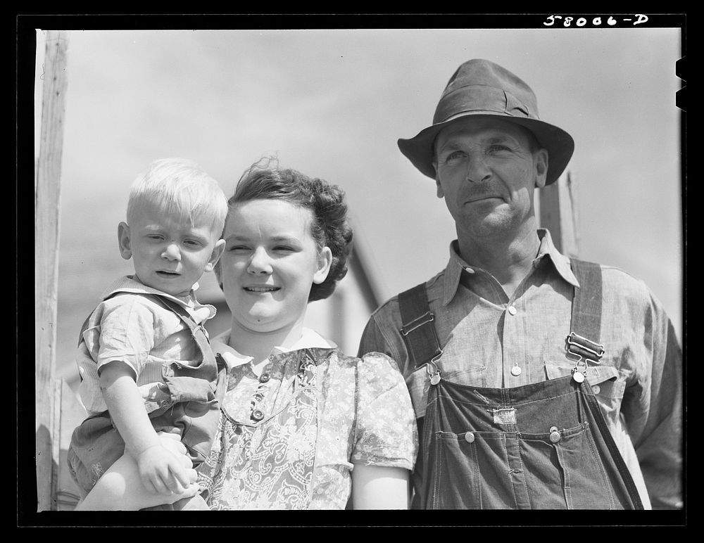 FSA (Farm Security Administration) borrower and two of his children. Laredo, Montana. Sourced from the Library of Congress.