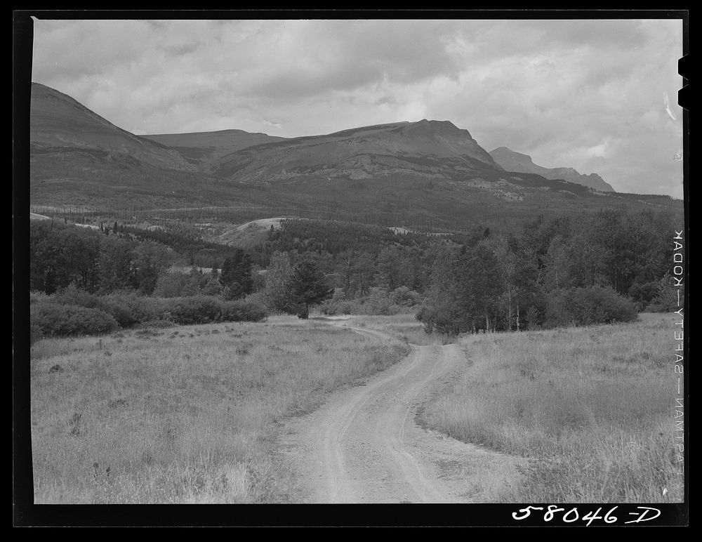 Road leading into mountains. Glacier National Park, Montana. Sourced from the Library of Congress.