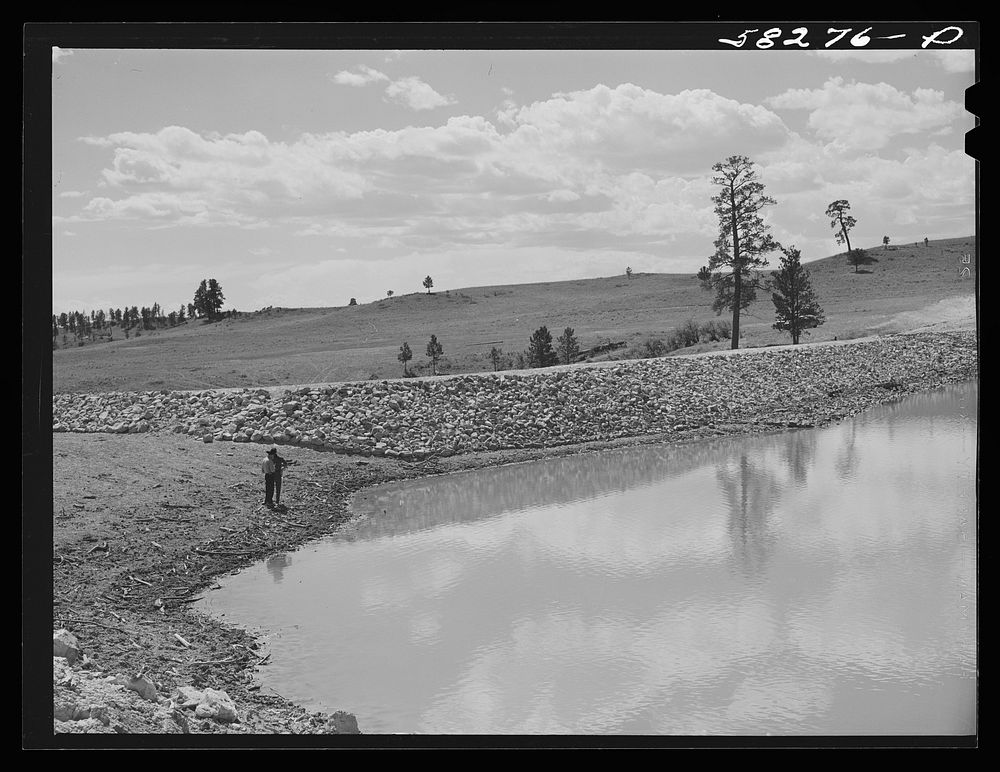 Reservoir for range cattle just finished on Lyman Brewster's lease. Near Lame Deer, Montana. Sourced from the Library of…