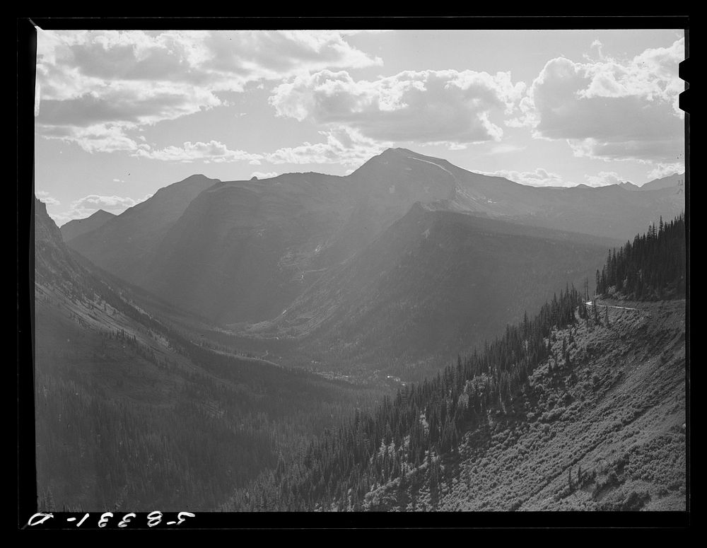 General view of Rocky Mountains west of Continental Divide seen from top of Logan Pass en route to the Sun highway. Glacier…