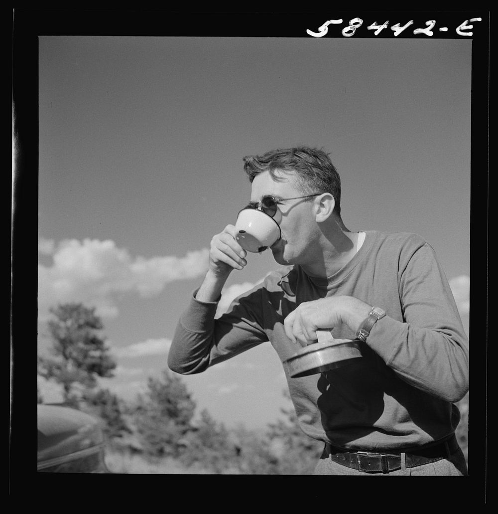 Dude from Quarter Circle U Ranch on a picnic on Lyman Brewster's lease. Near Lame Deer, Montana. Sourced from the Library of…