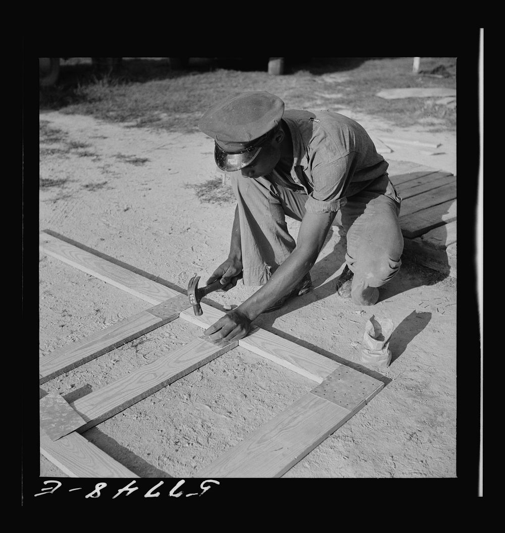 All joints are cut square and metal reinforced. Demonstration of home screen door construction. Saint Mary's County, Ridge…