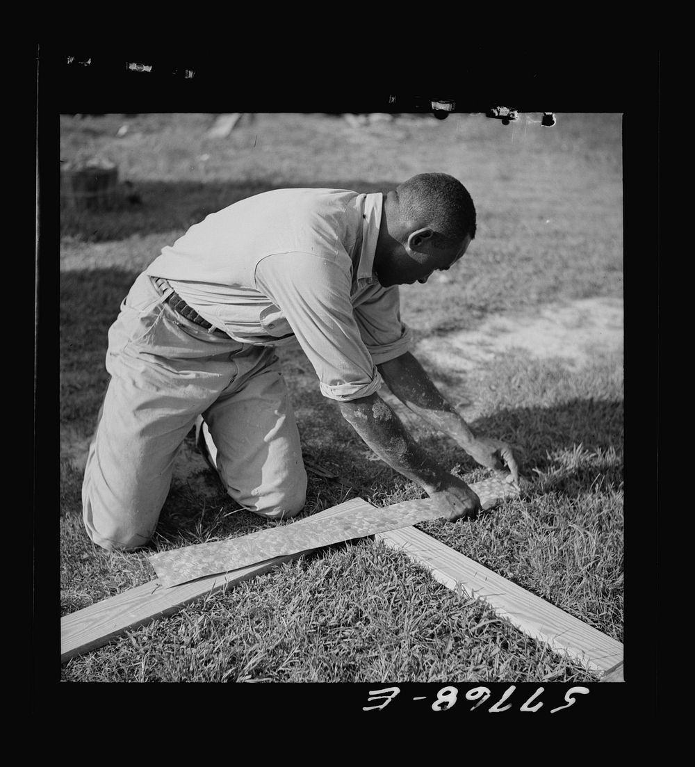 Measuring 24-gauge galvanized metal for cutting into rectangular reinforcements. Screening demonstration. Saint Mary's…