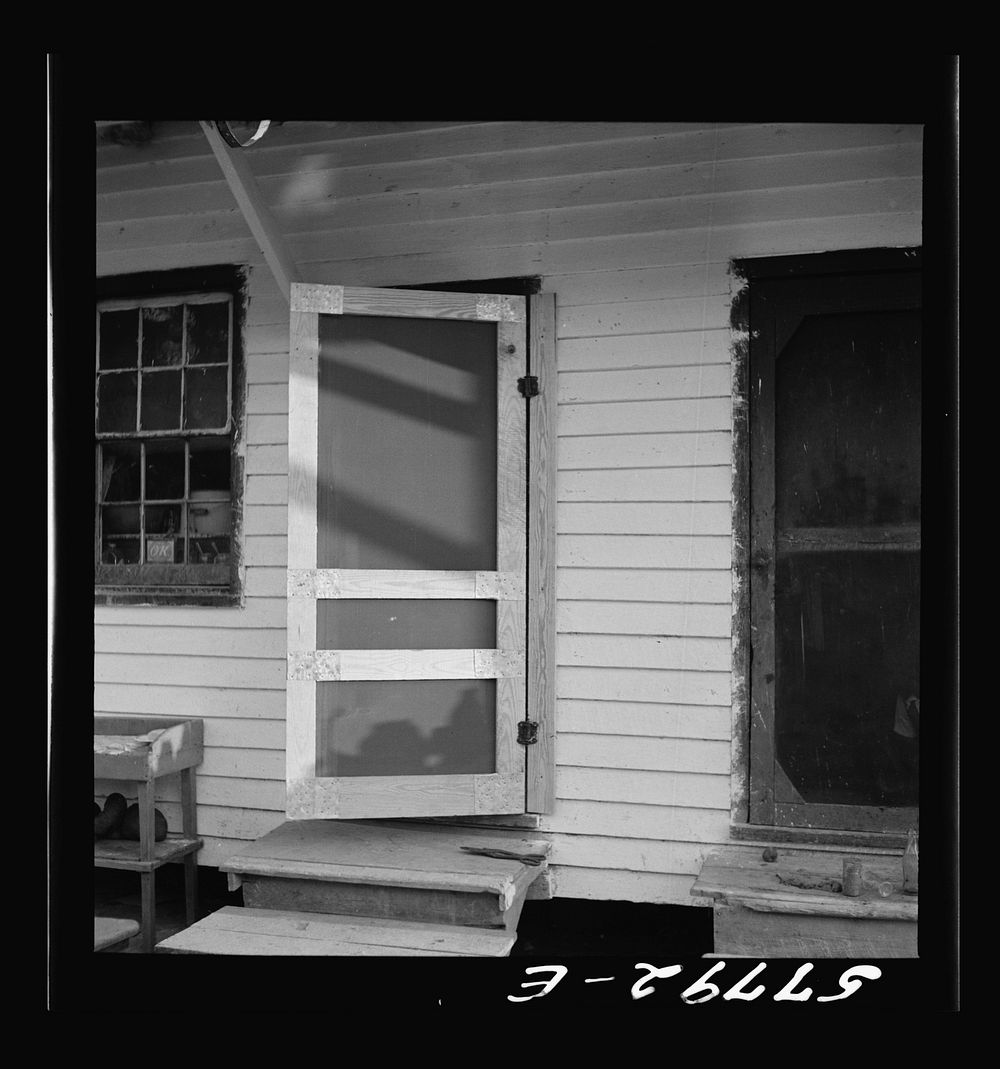 [Untitled photo, possibly related to: The finished door in place. Demonstration of home screen door construction. Saint…