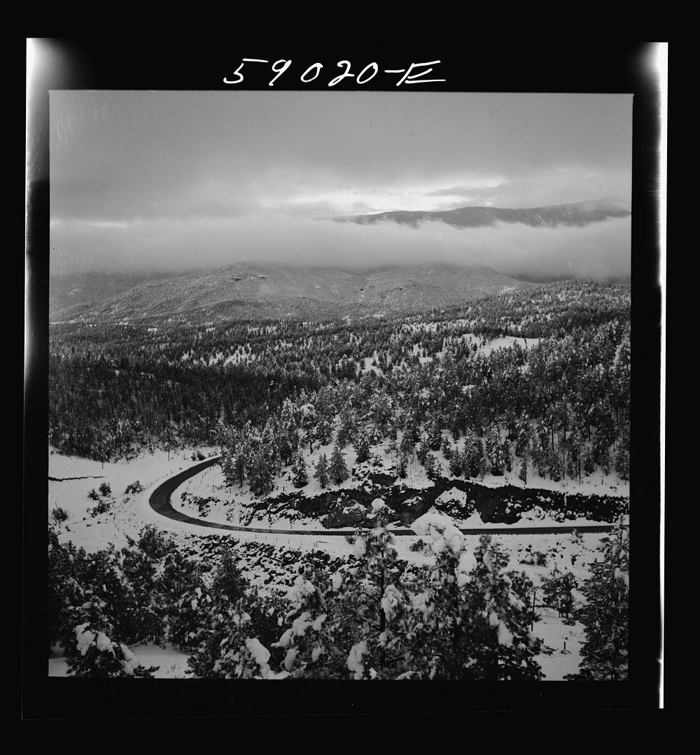 Highway across mountains near Bailey, Colorado, after early fall blizzard. Sourced from the Library of Congress.
