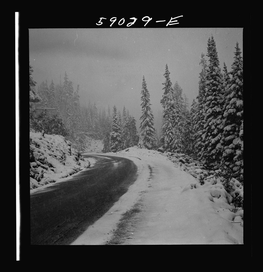 Highway across the mountains during early fall blizzard near Independence Pass, Colorado. Sourced from the Library of…
