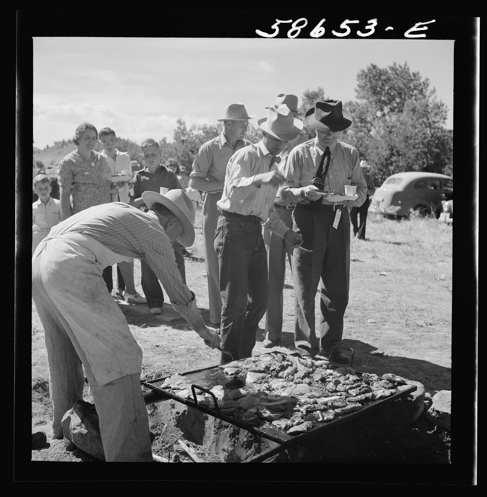 [Untitled photo, possibly related to: Waiting in line for barbecued beef at the stockmen's picnic and barbecue. Spear's…
