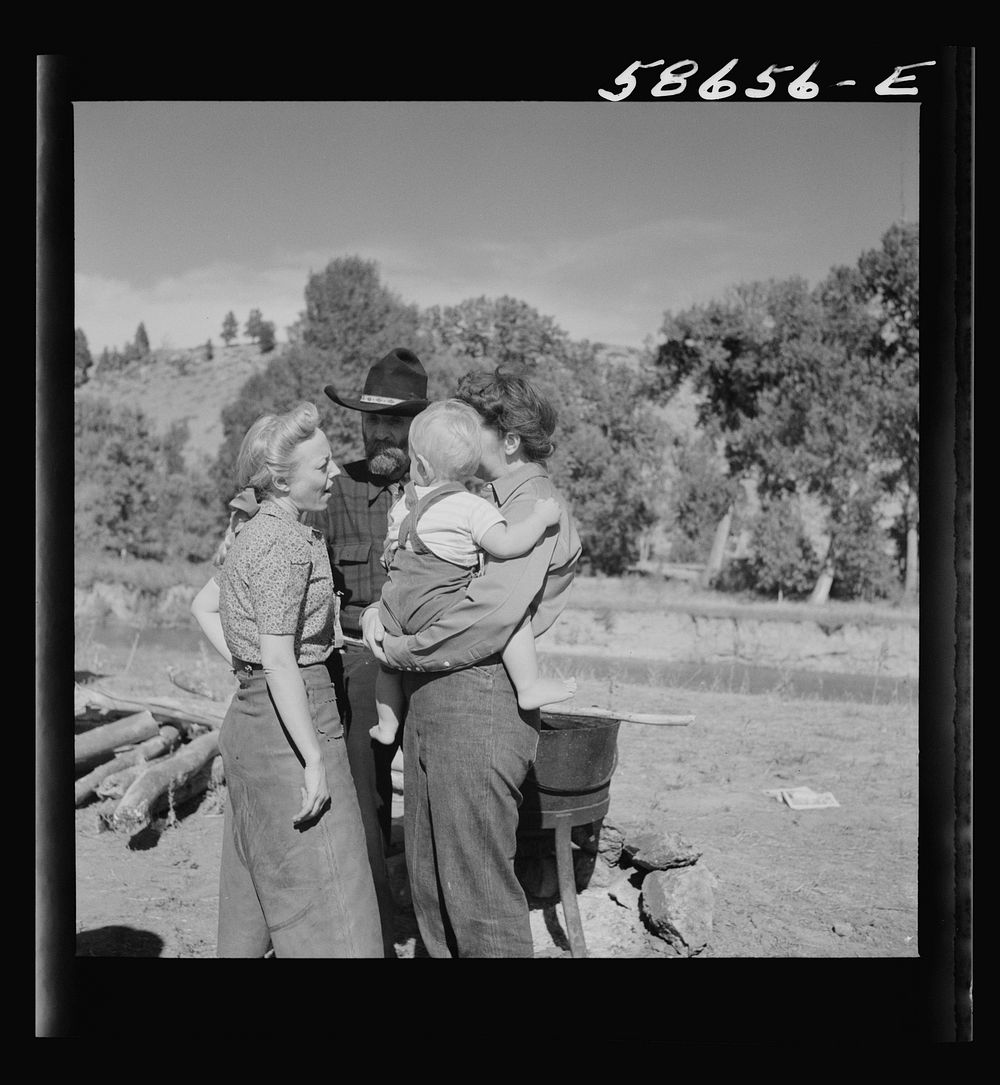 [Untitled photo, possibly related to: Spear's Siding, Wyola, Montana. Lyman Brewster of Quarter Circle U Ranch with Sally…