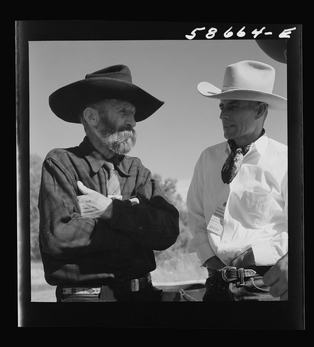 [Untitled photo, possibly related to: Lyman Brewster of Quarter Circle U Ranch with Turk Greenough's father (Sally Rand's…