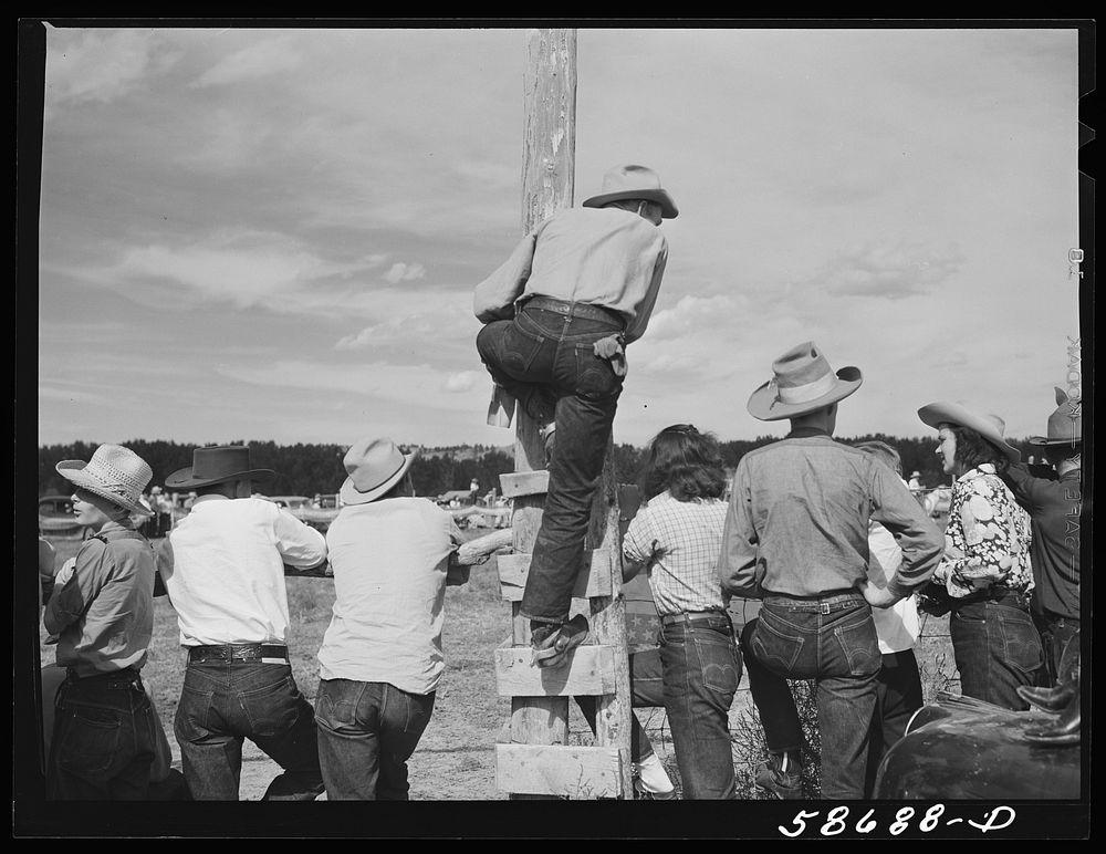[Untitled photo, possibly related to: Cowboys and spectators at Ashland rodeo, Montana]. Sourced from the Library of…