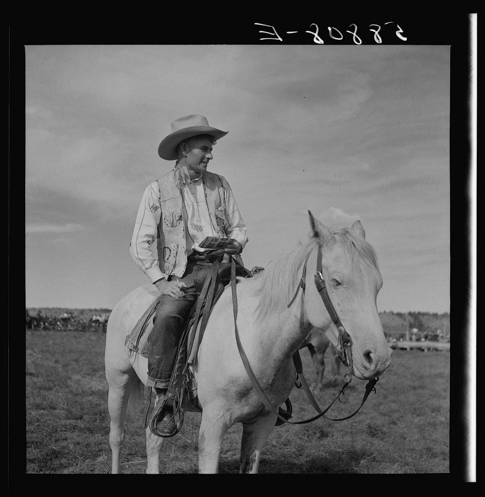 [Untitled photo, possibly related to: Lyman Brewster of Quarter Circle U. Ranch at annual rodeo, Ashland, Montana]. Sourced…