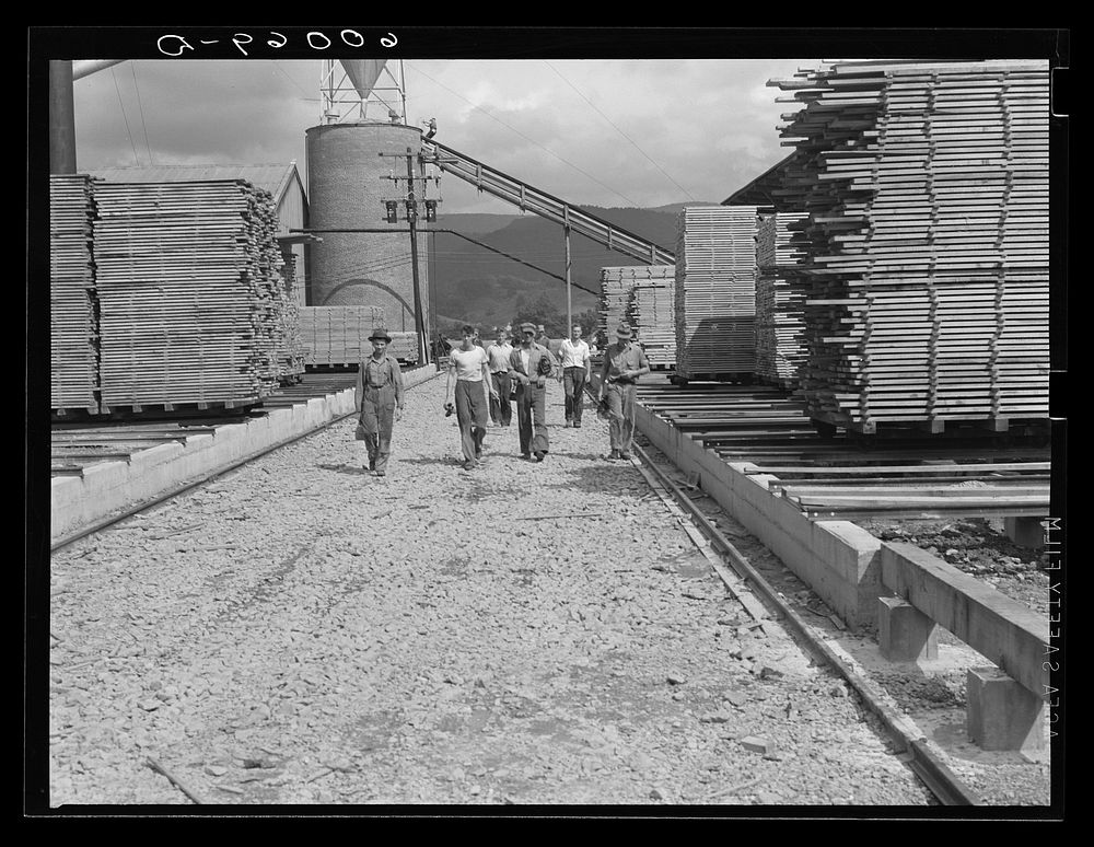 Men leaving work at dimension lumber plant at Tygart Valley Homesteads, West Virginia. Sourced from the Library of Congress.